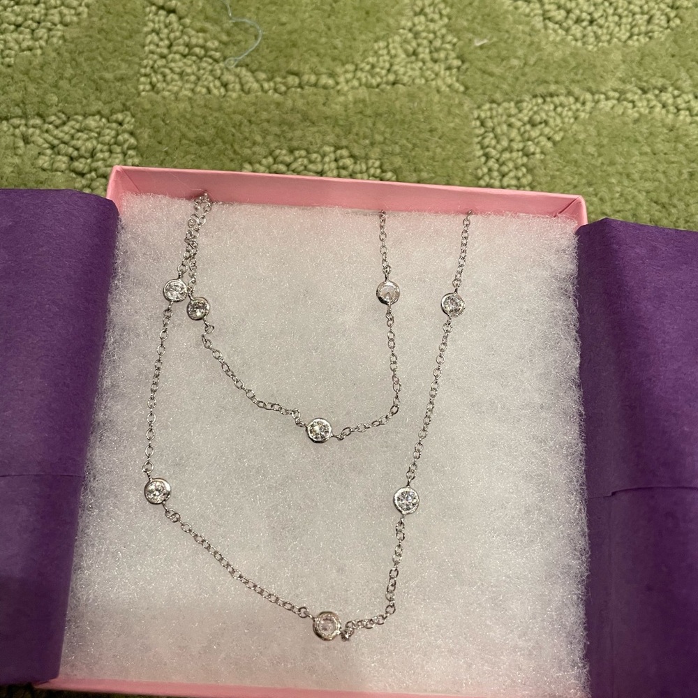 Brand new sterling silver necklace with jewels
